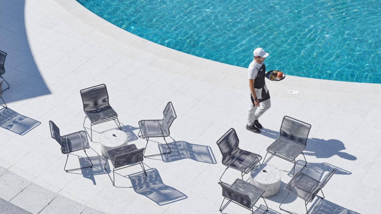 Nautilux Rethymno By Mage Hotels Exterior foto The poolside at the Four Seasons Hotel, Milan